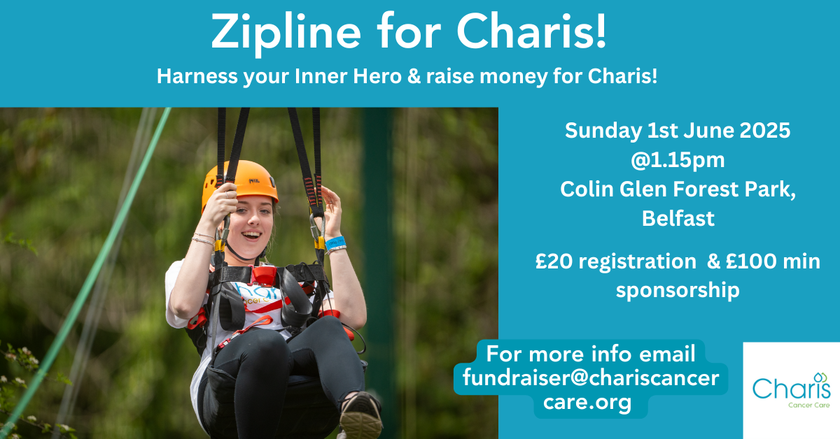 Image of a girl completing the zipline wearing a helmet and charis tshirt